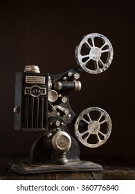 Old Film Projector Over A Dark Background