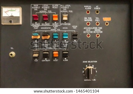 The old fire control panel which different colour of buttom.