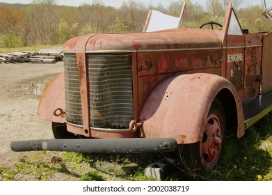 Old Fire Engine Rusting In A Field