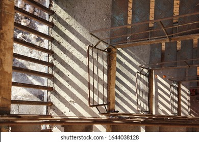 Old Fire Escape In Abandoned Residential Building, Top-down View In Perspective, Dangerous Parkour Jumping Drop