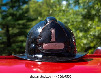 Old Fireman Helmet On A Truck Closeup