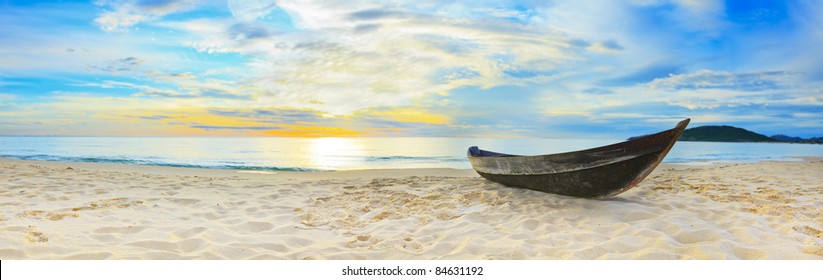 Old fisherman boat at the beach. Panorama