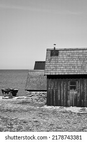 Old Fishermen Village On Faro, Gotland, Sweden. Old Wood Houses, A Boat And A Sea View.