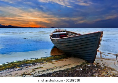 The Old Fishing Boat At Sunset