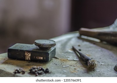 old flashlight on a table
