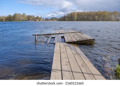 Old flooded jetty on the lake - Powered by Shutterstock