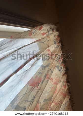Old Floral Pattern Kitchen Curtains Hanging in Vintage Interior Home Setting