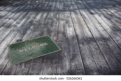 Old Foot Scraper Mat On Wooden Floor