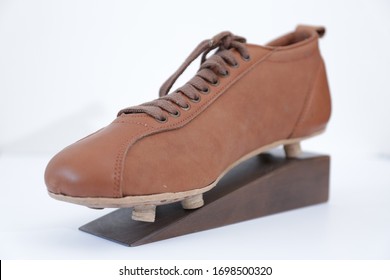 Old Football Boots With Wooden Crampons