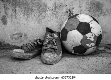 Old Football And Shoes Vintage Close Up.