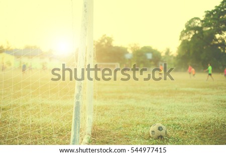 old football Vintage photography with soccer goal with lens flare effect