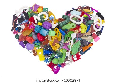 Old Forgotten Broken Little  Mass Production No Name Toys Details At Heart Symbol Isolated. All Trademarks Is Removed.