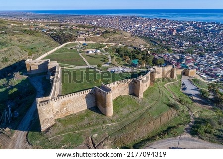 Old fortress Naryn-Kala in the urban landscape (top view). Derbent, Republic of Dagestan. Russia