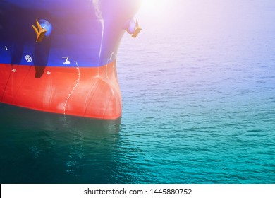 Old Forward And Bulbous Bow Ship Alongside In The Sea Both Anchoring Hanging At Front Vessel.