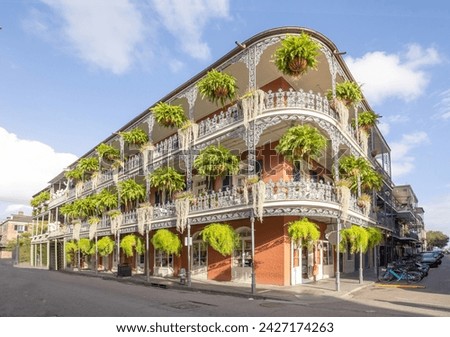 Similar – Image, Stock Photo Balconies of a new building block in the countryside with a red parasol / balcony