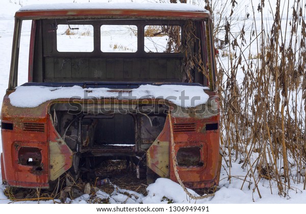 old frozen car,old\
soviet car in the snow