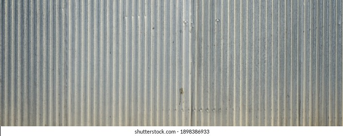 Old galvanized sheet wall with rust background - Powered by Shutterstock