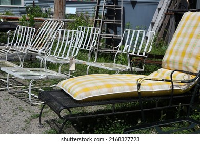 Old Garden Furniture Set Out For Yard Sale