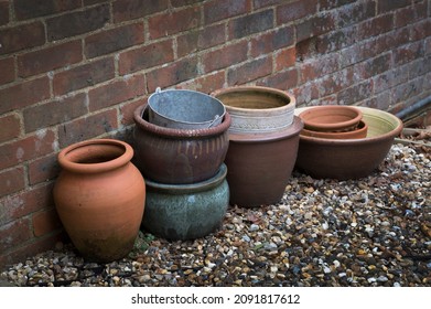 Old Garden Pots Left Beside Old Garden Shed Wall