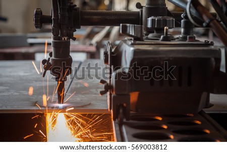 Old gas cutters cut steel plates.