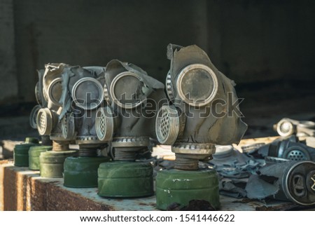 Old gas masks in abandoned building in Pripyat city in Chernobyl (Chornobyl) Exclusion Zone, Ukraine