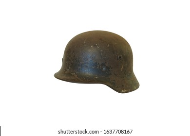 An old German steel military helmet from World War I / II on an isolated white background
