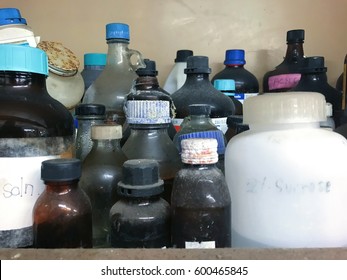 Old Glass Bottles Contain Chemical Reagent In Laboratory