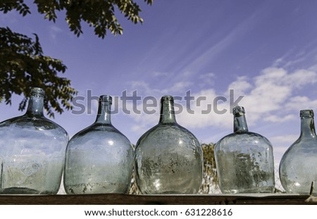 Image, Stock Photo Save Water. Drink Wine. Wine wooden box with fruit and vineyard summer background. Variations of fruits and herbs (mint) in a wooden box with landscape of vineyard with green leaves in the background. funny drink concept.