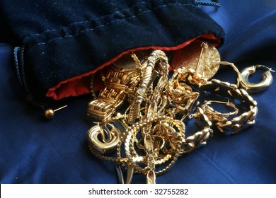 Old Gold  Jewelry On Blue Silk