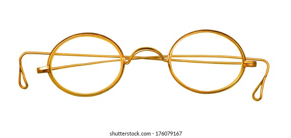Old golden glasses on white  