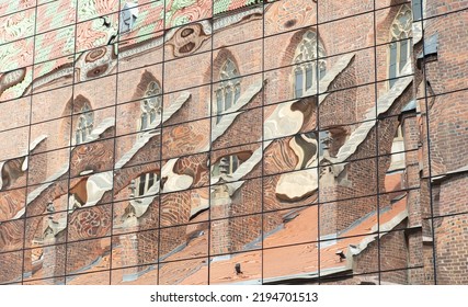 Old Gothic Cathedral Reflection In A Modern Corporate Office Building Glass Windows. Old Vs New, Different Generations, The Past Vs The Future Art And Historical Cultural Heritage Concept, Nobody