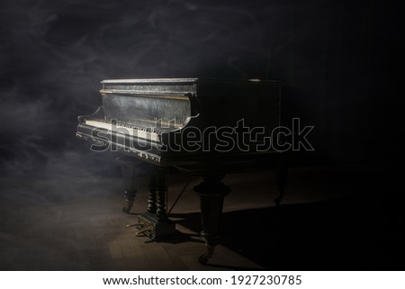 Old grand piano on the stage
