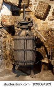 Old grape press for wine