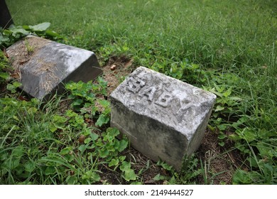 An Old Gravestone Marked For A Baby Tombstone Graveyard