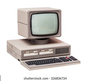Old gray computer isolated on a white background