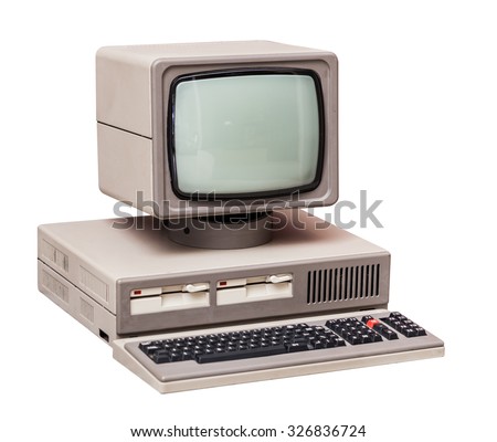 Old gray computer isolated on a white background