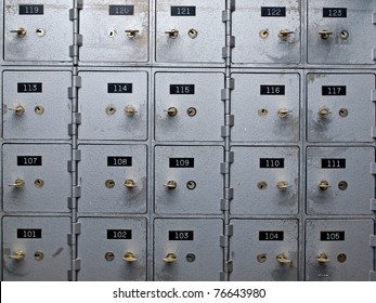 Old Gray and Numbered Safety Deposit Boxes