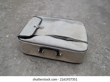 Old Gray Rubberized Suitcase. Luggage Zipper