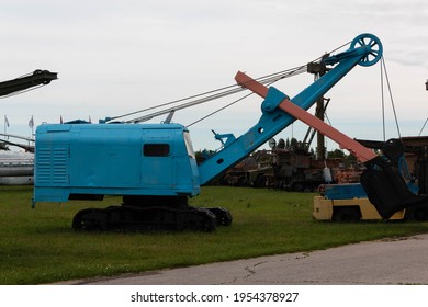 Old Gray Snow Plow Tractor