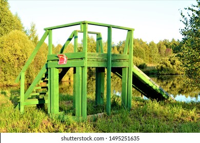 Old Green Diving Board Sign In Red 