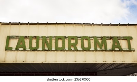 Old Green Laundromat Sign