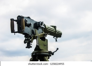 Old Green Machine Gun Against The Sky