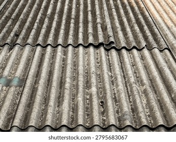 Old Grey Corrugated Roofing Sheets with Slanted Wave Pattern