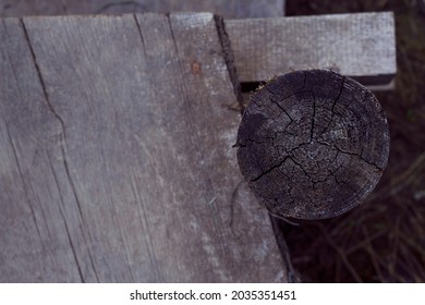 Old grey wooden bridge with top view close up. Weathered wood outdoors background.