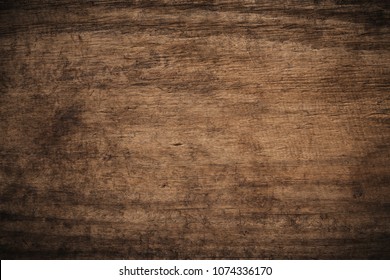 Old grunge dark textured wooden background,The surface of the old brown wood texture,top view brown wood panelitng - Shutterstock ID 1074336170
