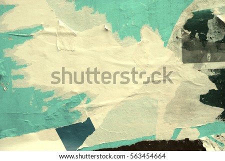 Old grunge ripped torn vintage collage posters creased crumpled paper surface texture background backdrop space for text