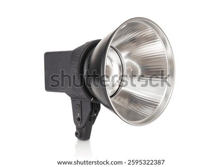 Old, grunge studio impulse flash on white background