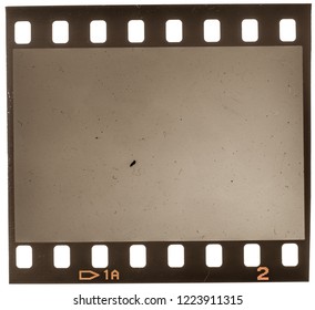 old and grungy 35mm dia filmstrip on white, real macro photo