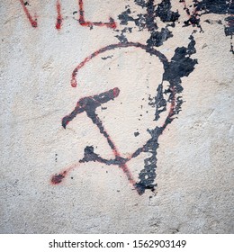 Old Grungy Communism Symbol Graffiti On A Wall, Red Color