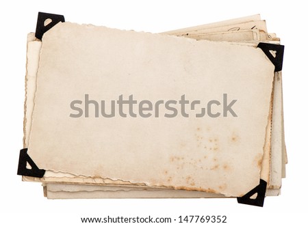 old grungy paper sheets isolated on white background. photo card with black corner